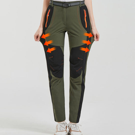 Pantaloni da trekking in vita elastica e elastica calda impermeabile.