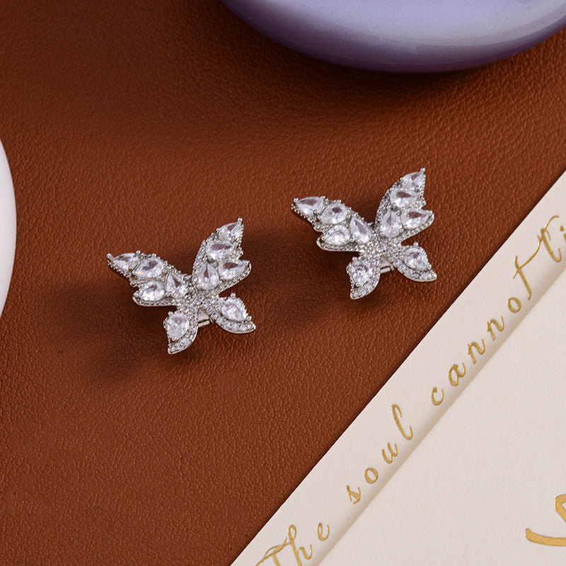 Muodikkaat Clip-On langattomat kuulokkeet käsilaukulla